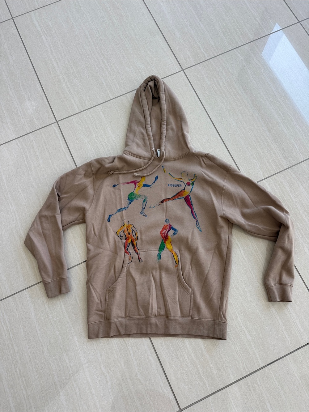 KidSuper Brown Graphic Hoodie with Multicolor Dance Print